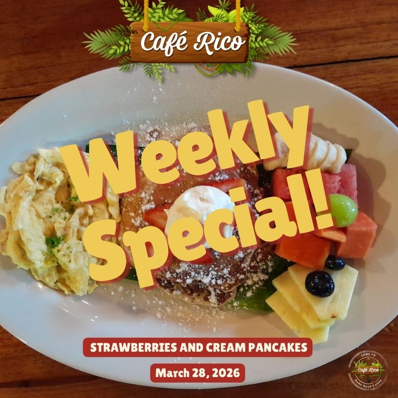 Strawberries and cream pancakes filled with fresh strawberries served with scrambled eggs and fruit at Café Rico in Puerto Viejo Costa Rica