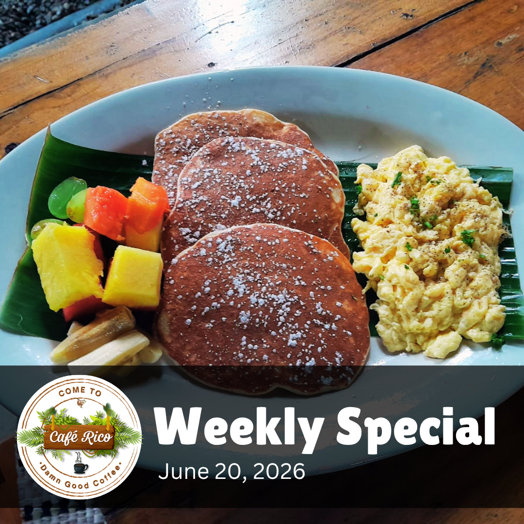 Banana pancakes at Café Rico, known for the best breakfast in Puerto Viejo Costa Rica, served with scrambled eggs and fresh local fruit